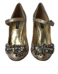 Chaussures Dolce & Gabbana Mary Janes en jacquard doré avec cristaux, élégantes et brillantes, vues de face.