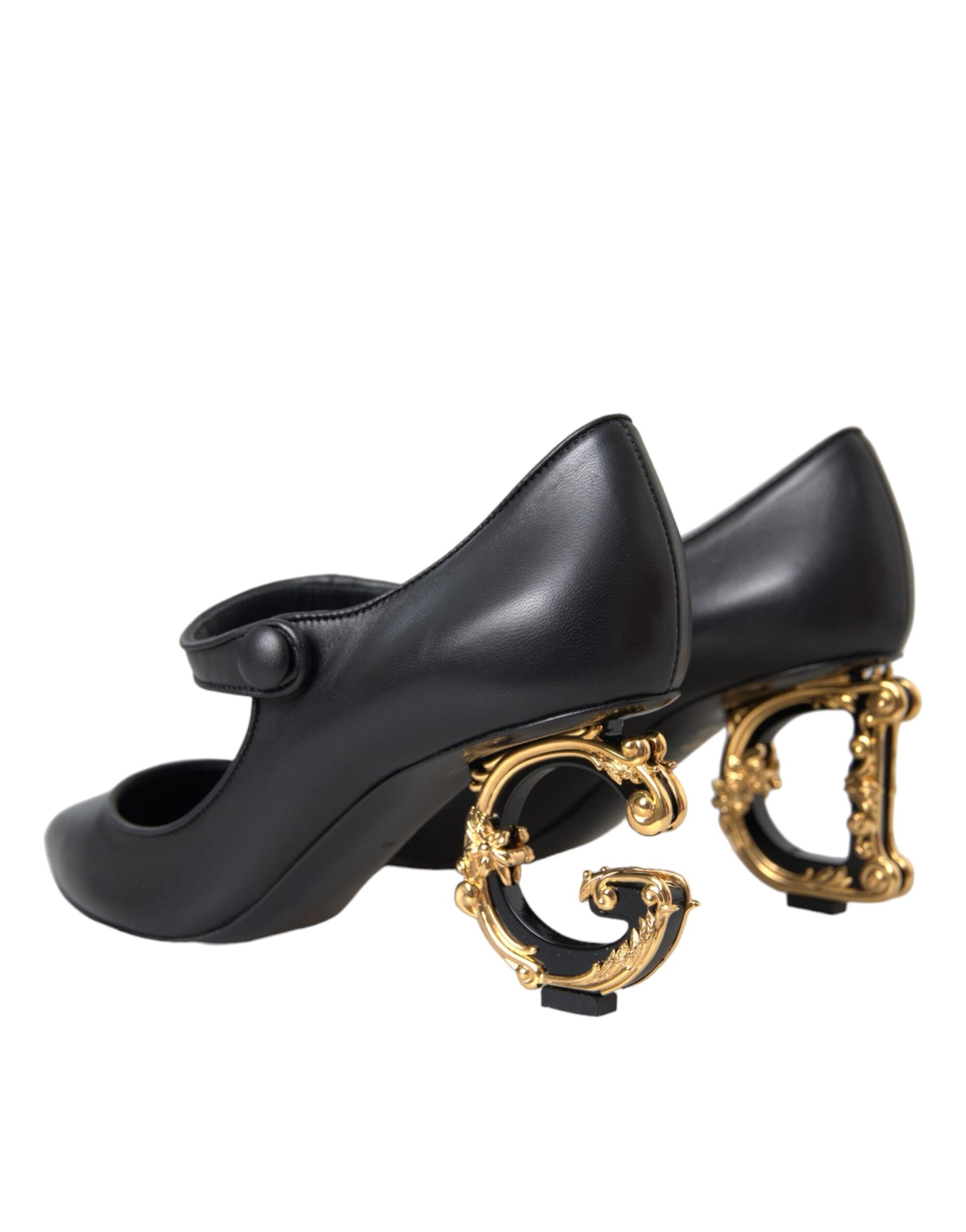 Chaussures à talons noirs Dolce & Gabbana en cuir avec logo, style Mary Janes, élégantes et sophistiquées.