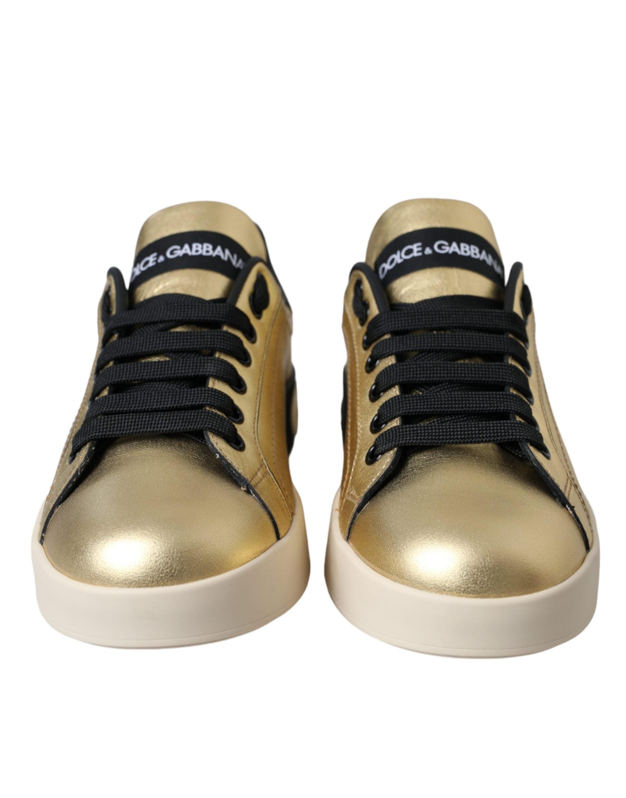 Sneakers pour femmes Dolce & Gabbana Portofino en cuir de veau doré, style élégant et moderne, vue de face.