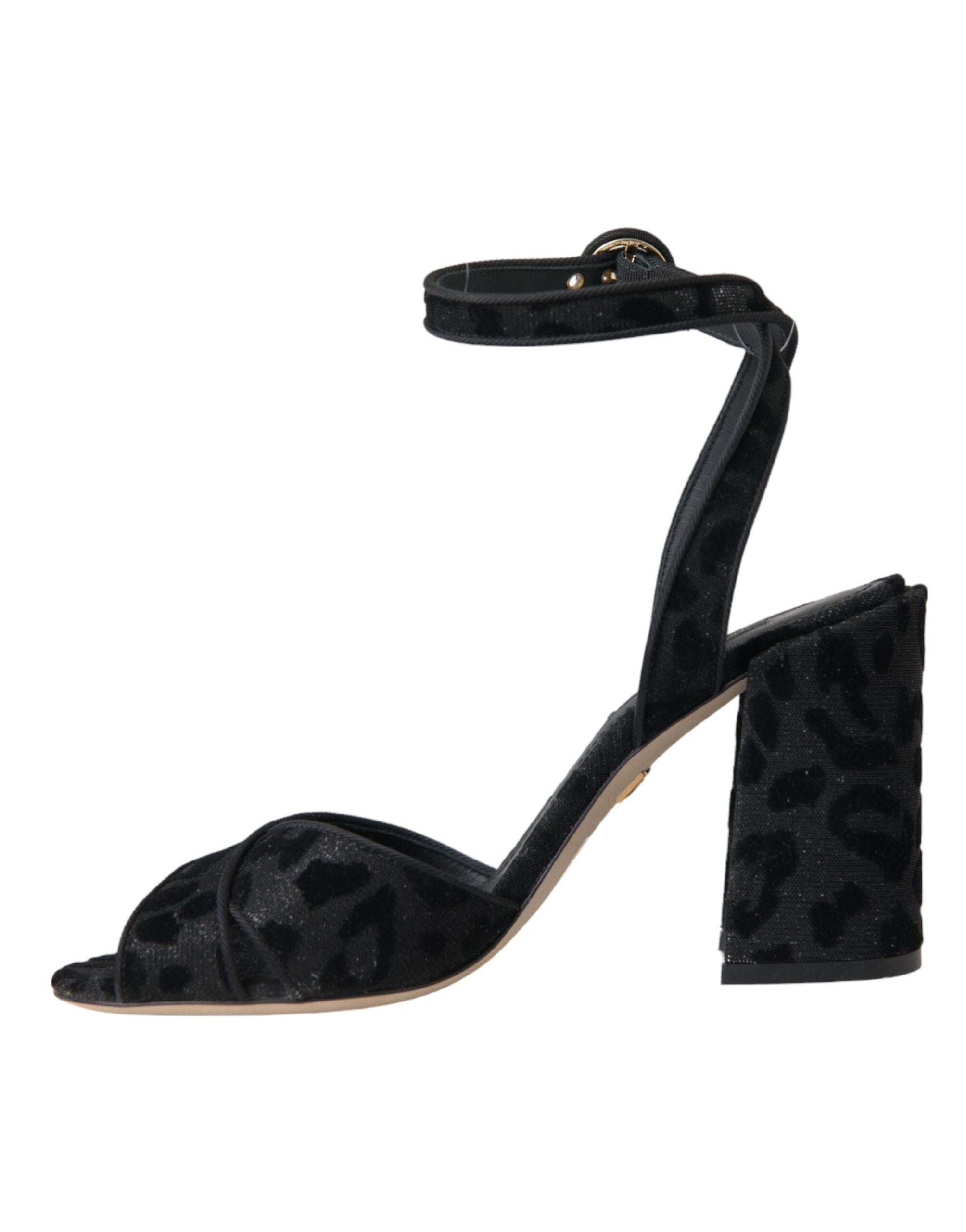 Escarpins Dolce & Gabbana en daim noir avec motif léopard, semelles élégantes, chaussure à talon haut sophistiquée.
