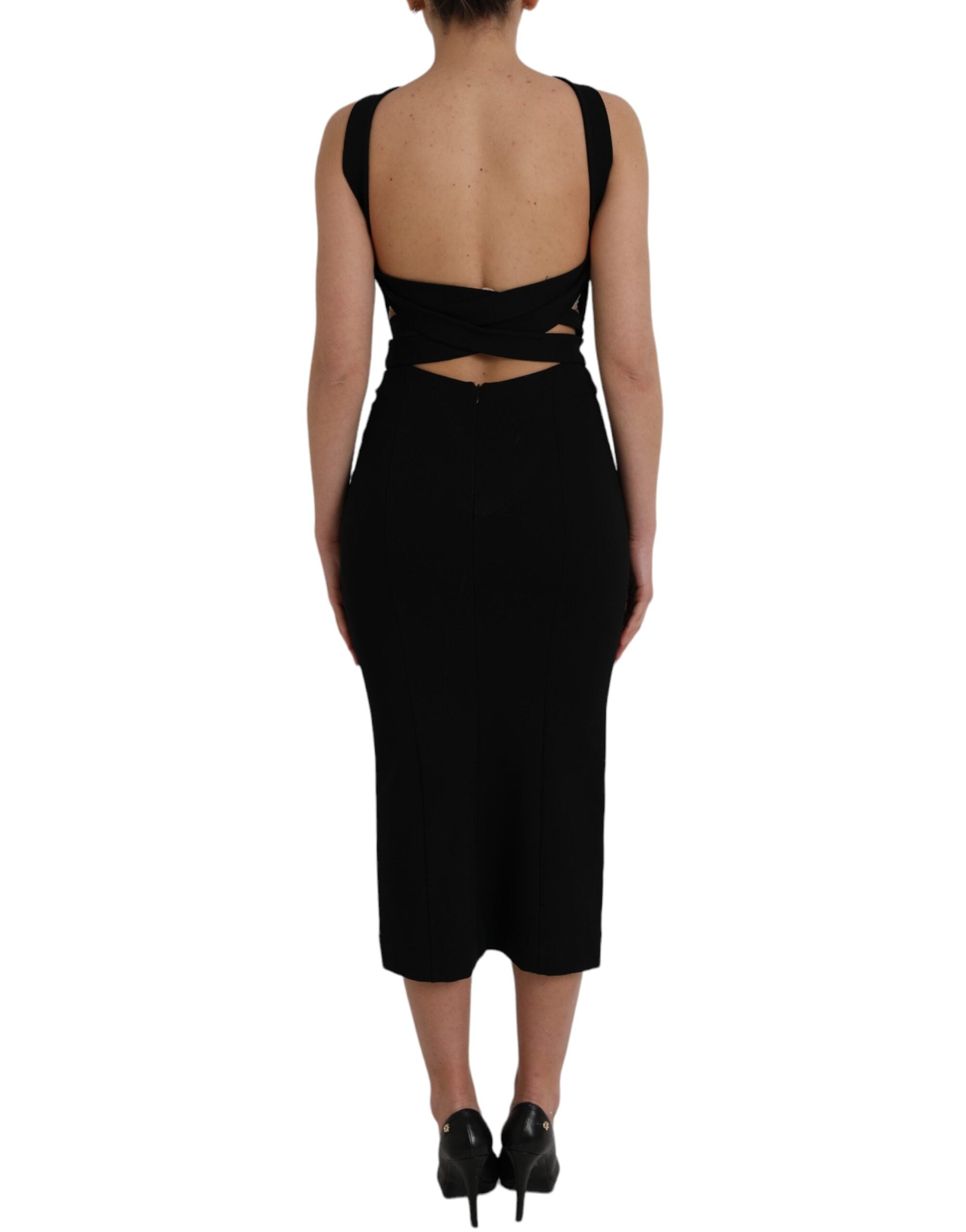 Robe midi noire sans manches Dolce & Gabbana, coupe ajustée et encolure en halter, vêtement élégant et sophistiqué.
