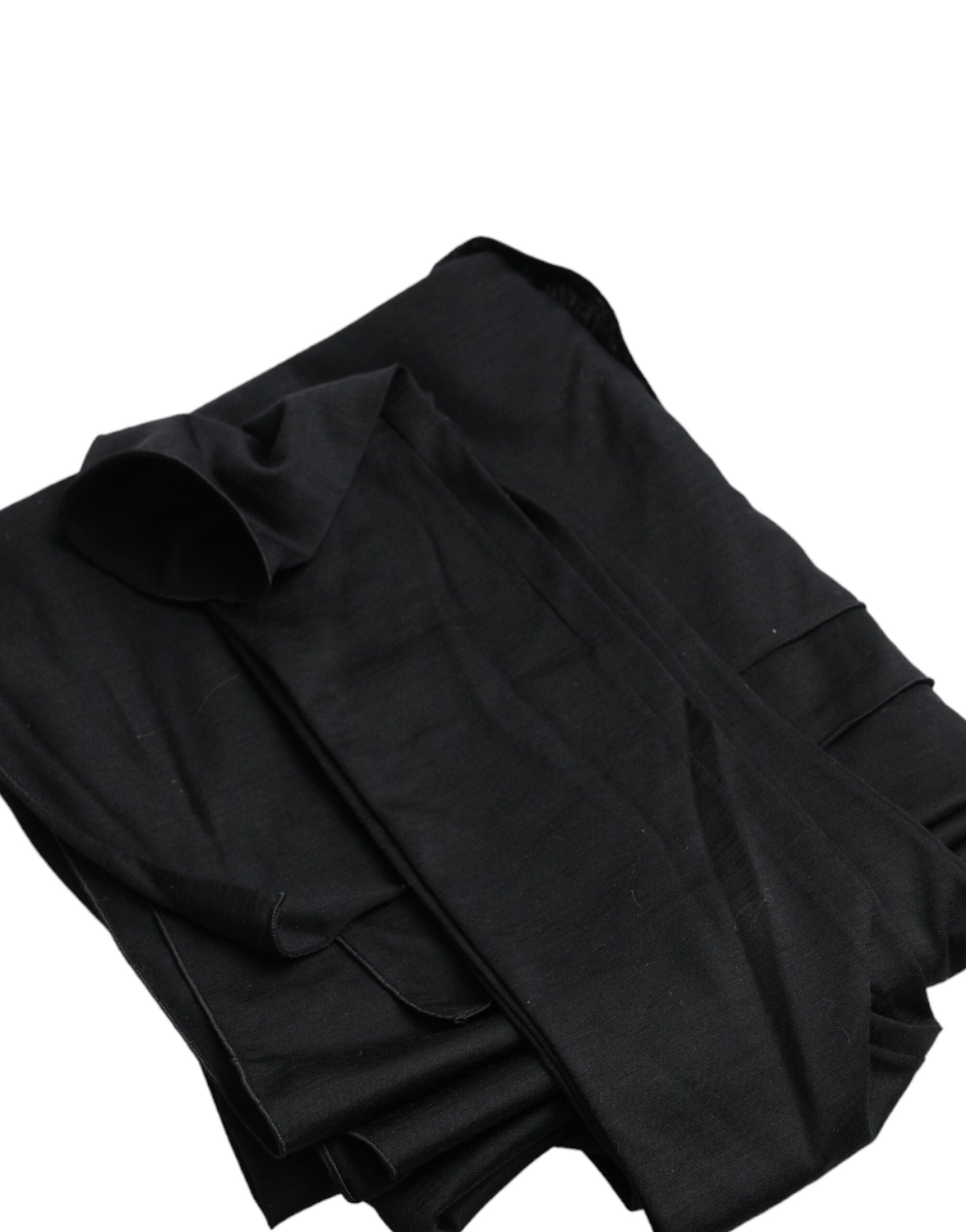 Haut noir en laine Dolce & Gabbana, coupe asymétrique avec découpes et manches longues, style élégant et moderne.