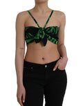 Haut court en soie noir et vert à feuilles, style halter, de la marque Dolce & Gabbana, avec design élégant et tissu fluide.