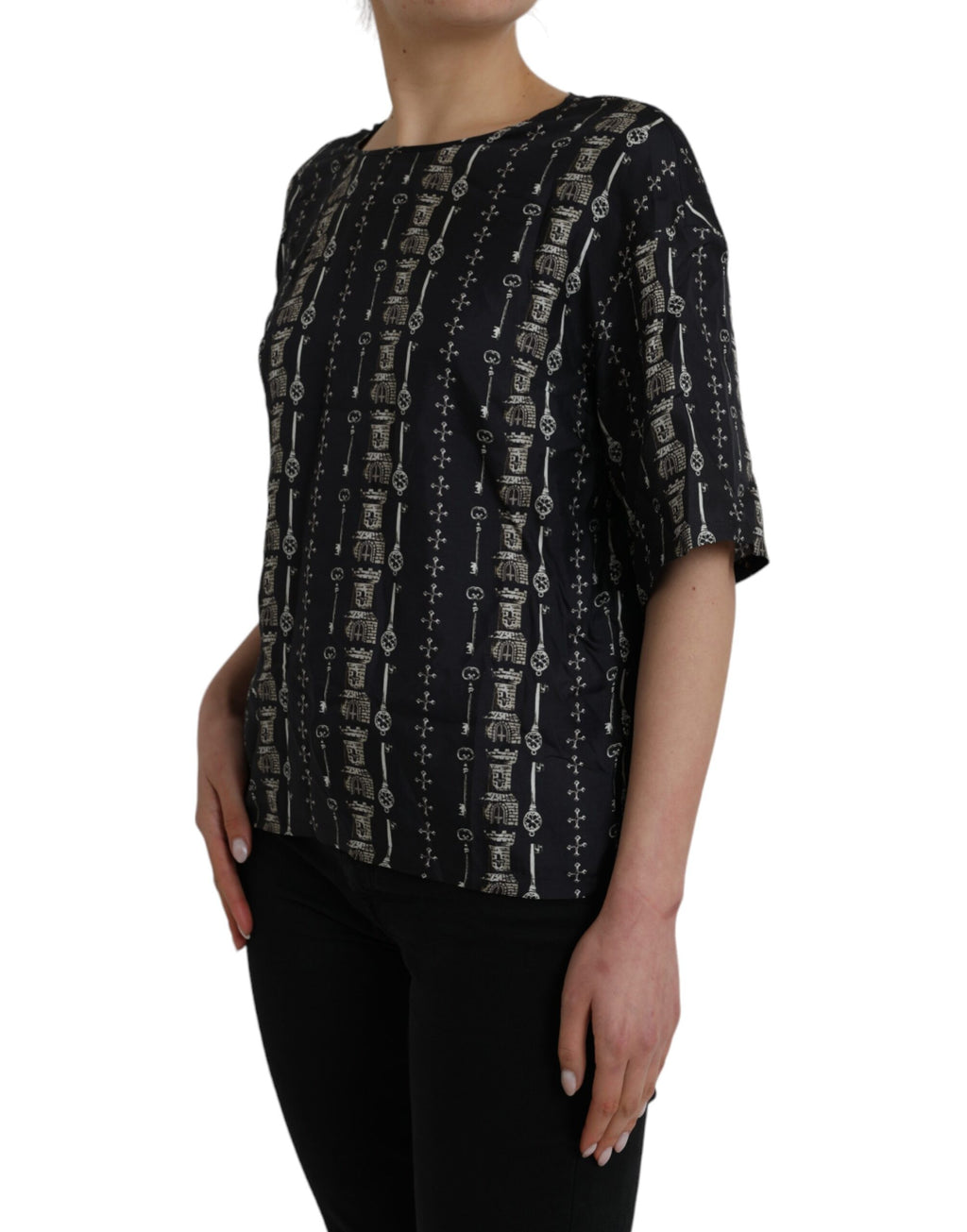 Chemise en soie noire Dolce & Gabbana avec motif clé et château, élégante blouse à impression artistique.