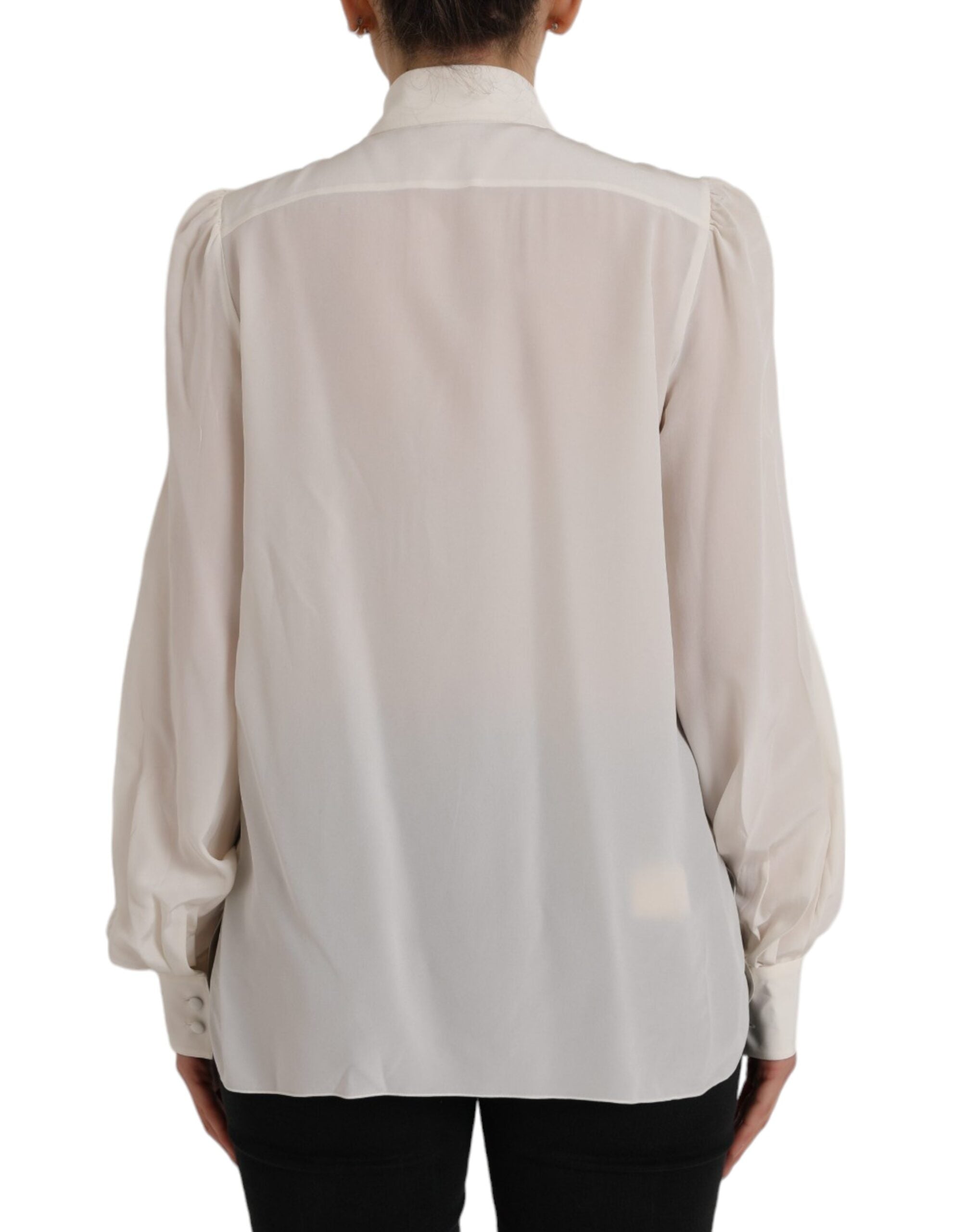 Chemise blanche à manches longues Dolce & Gabbana, boutonnière élégante, tissu léger et coupe classique.