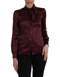 Haut à manches longues Dolce & Gabbana en col ascot bordeaux, blouse élégante avec détails sophistiqués.