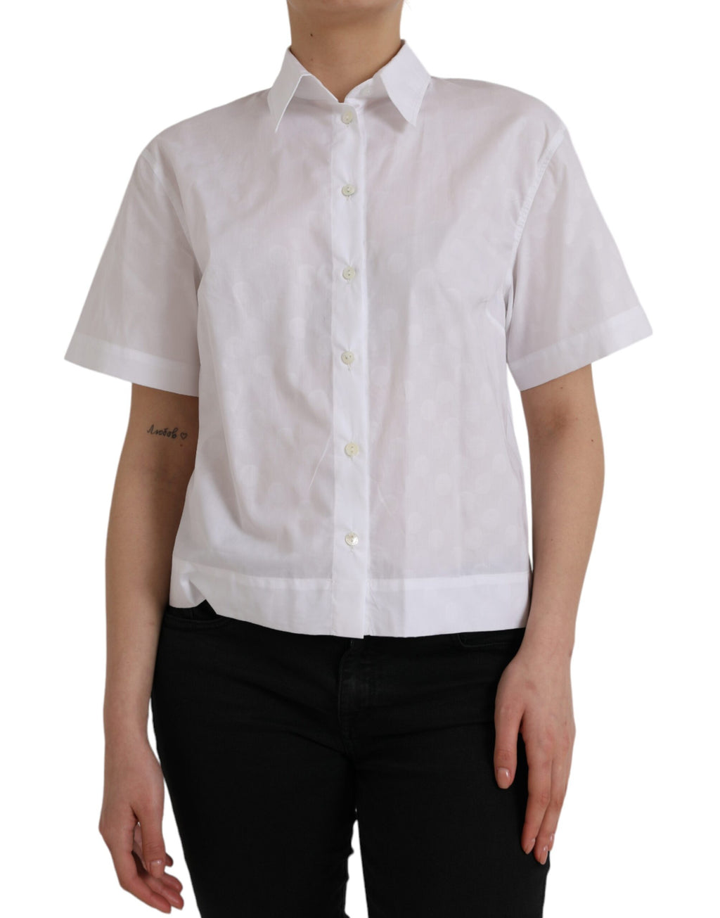 Chemise polo blanche à col Dolce & Gabbana, manches courtes, style élégant et décontracté, en tissu léger.