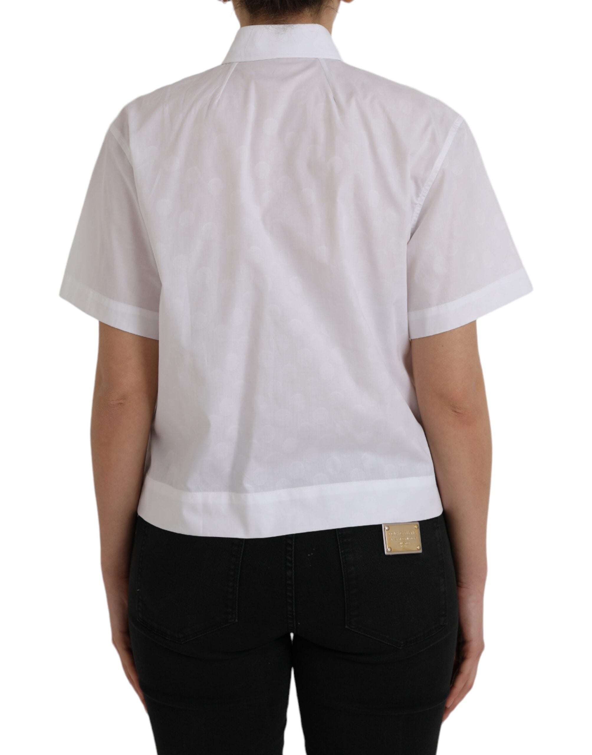 Chemise polo Dolce & Gabbana blanche à col et manches courtes, tissu léger et style élégant, vue de face.