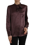 Chemise longue Dolce & Gabbana marron avec col ascot et manches longues, en tissu élégant et sophistiqué.