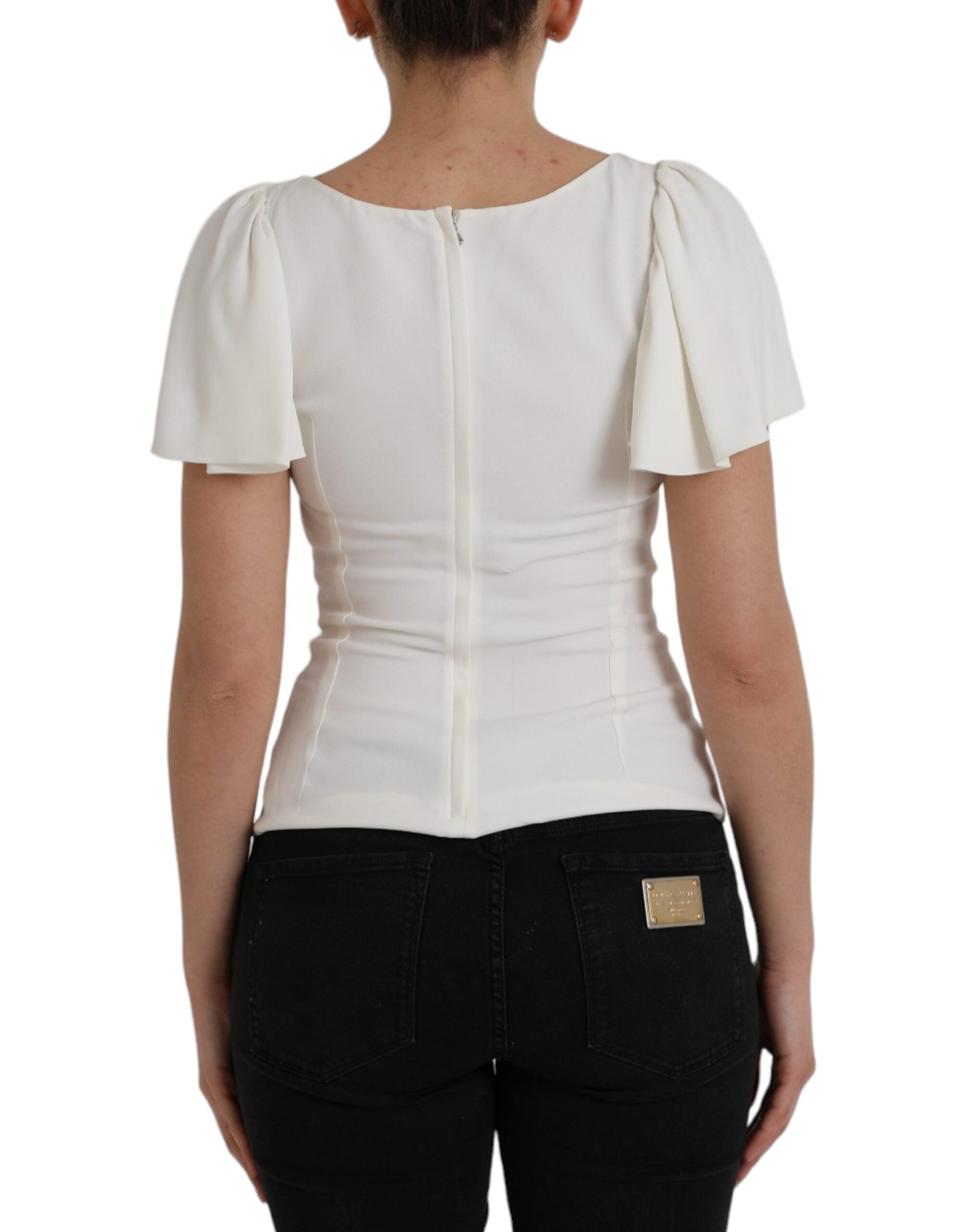 Haut blanc en viscose à col rond et manches courtes de Dolce & Gabbana, tissu léger et élégant.