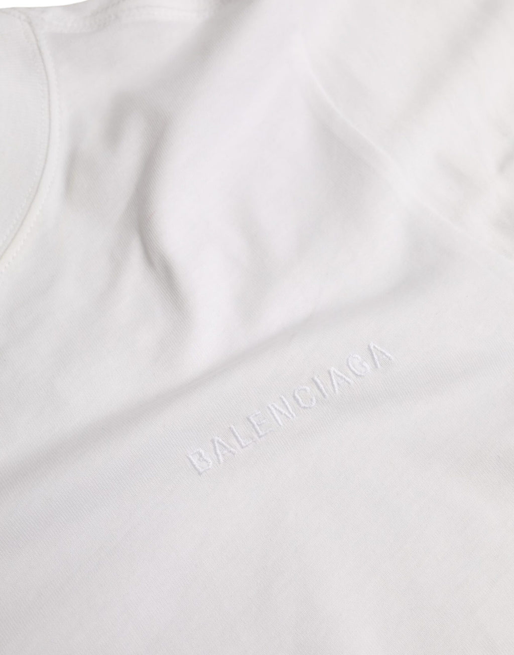 T-shirt blanc à manches courtes et col rond de Balenciaga en coton, vue de face.