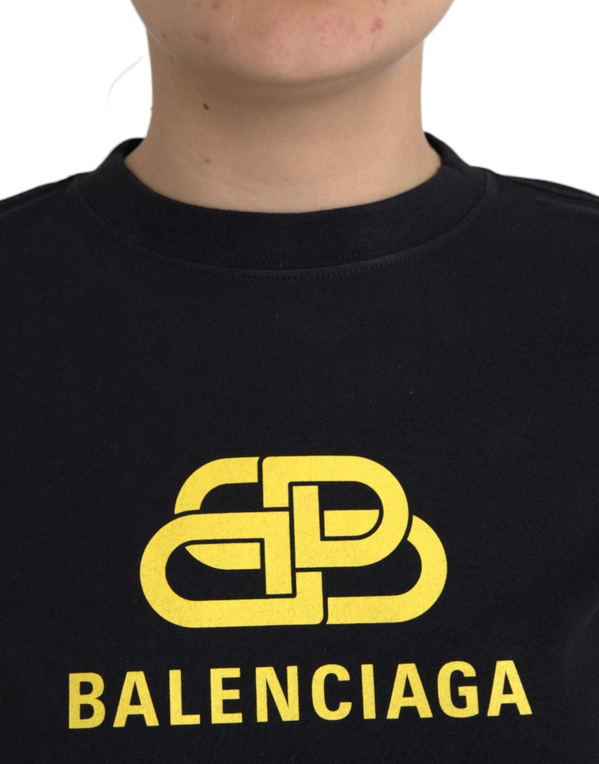 T-shirt à manches courtes Balenciaga en coton noir avec logo imprimé, col rond, style décontracté.