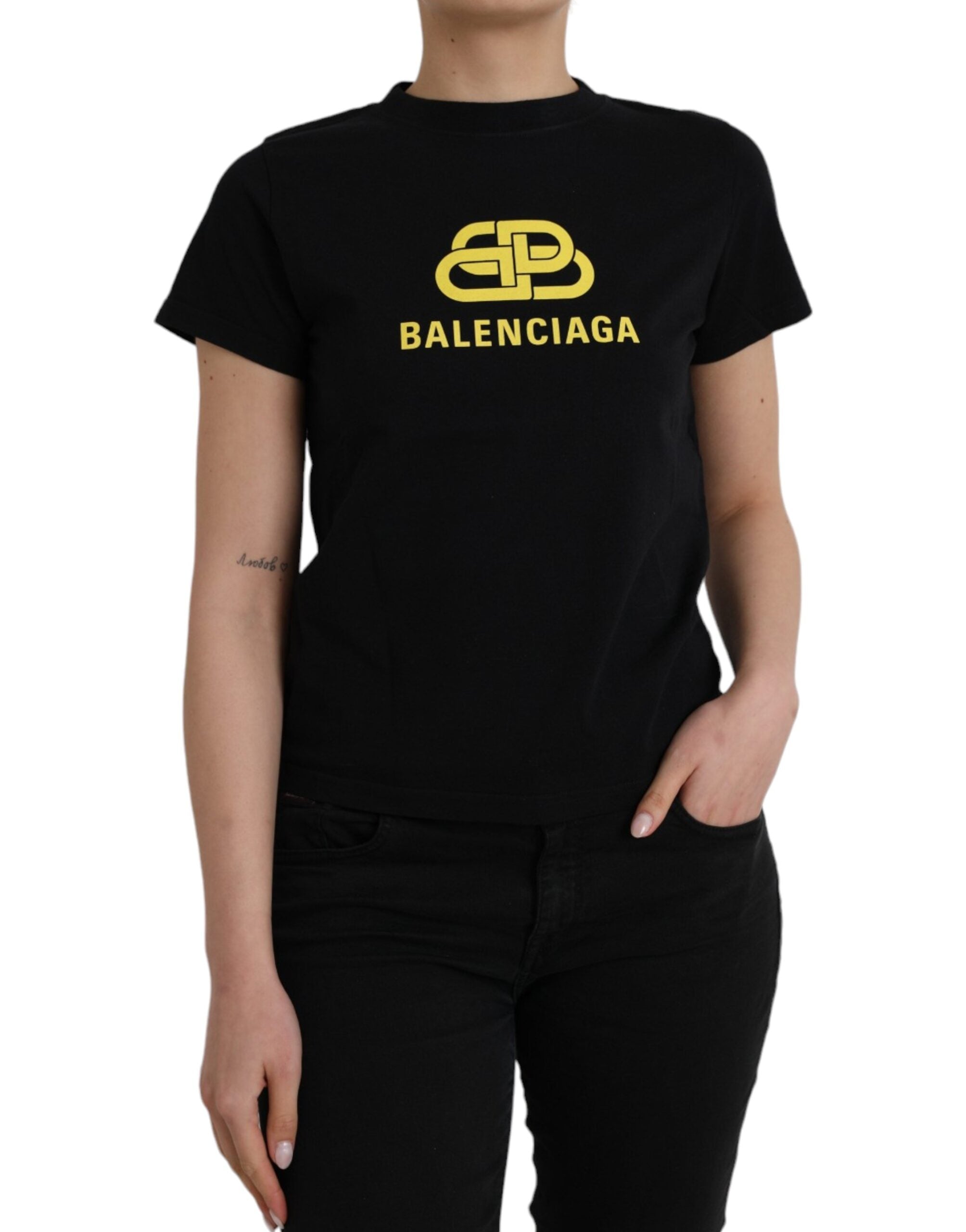 T-shirt noir en coton Balenciaga avec logo, col rond, manches courtes, style décontracté et moderne.