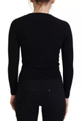 Pull en laine noir Dolce & Gabbana à boutons, cardigan slim ajusté, style élégant et classique.