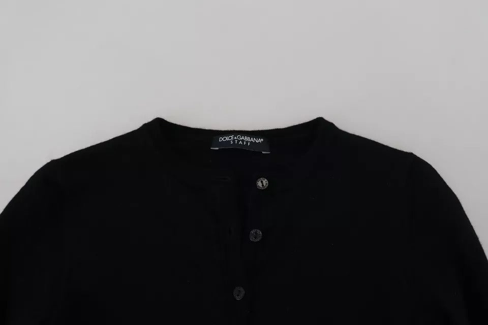 Pull-over noir Dolce & Gabbana en laine, cardigan slim à boutons, style élégant et ajusté.