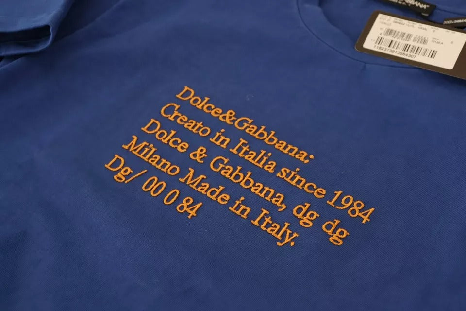 T-shirt en coton Dolce & Gabbana à logo imprimé bleu, col rond et coupe décontractée, visible en gros plan.