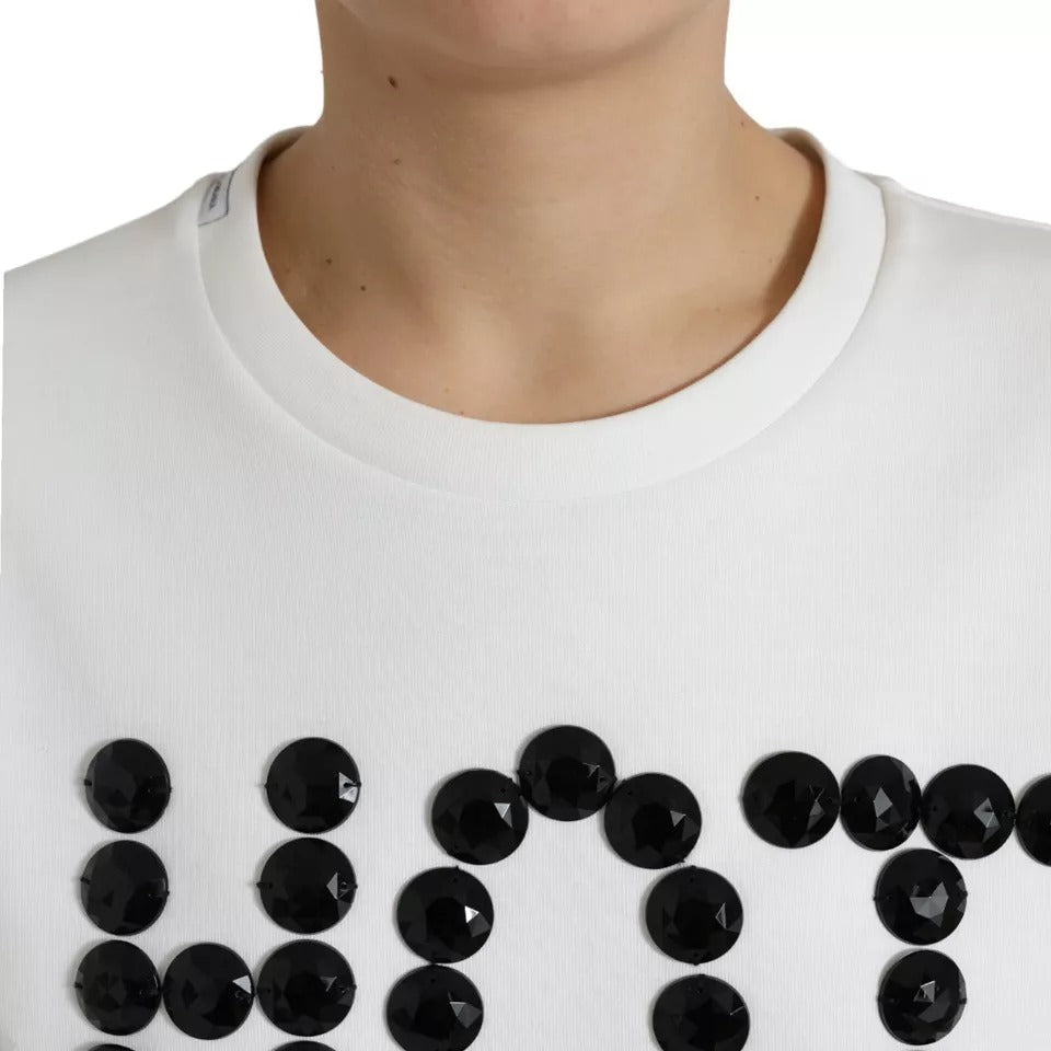 T-shirt blanc en coton Dolce & Gabbana avec détails en cristal noir et design élégant, vue frontale.