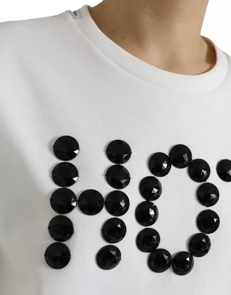 T-shirt blanc en coton Dolce & Gabbana avec détails en cristal noir et design élégant, vue de face.