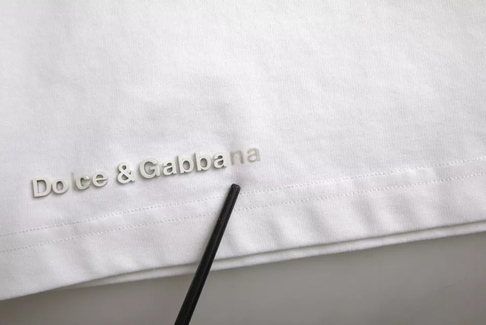 T-shirt blanc Dolce & Gabbana en coton avec logo embossé et col rond, vue de face.