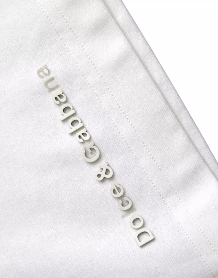 T-shirt blanc en coton Dolce & Gabbana avec logo embossé, col rond et design élégant.