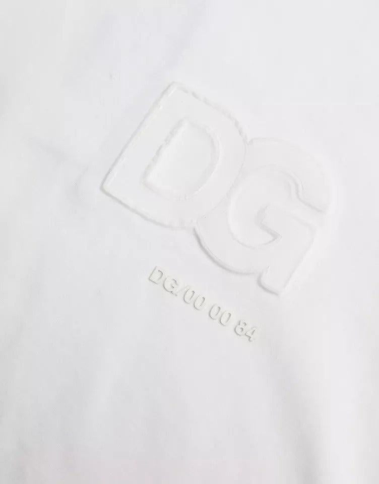 T-shirt blanc en coton Dolce & Gabbana avec logo embossé, col rond et design simple visible sur l'image.