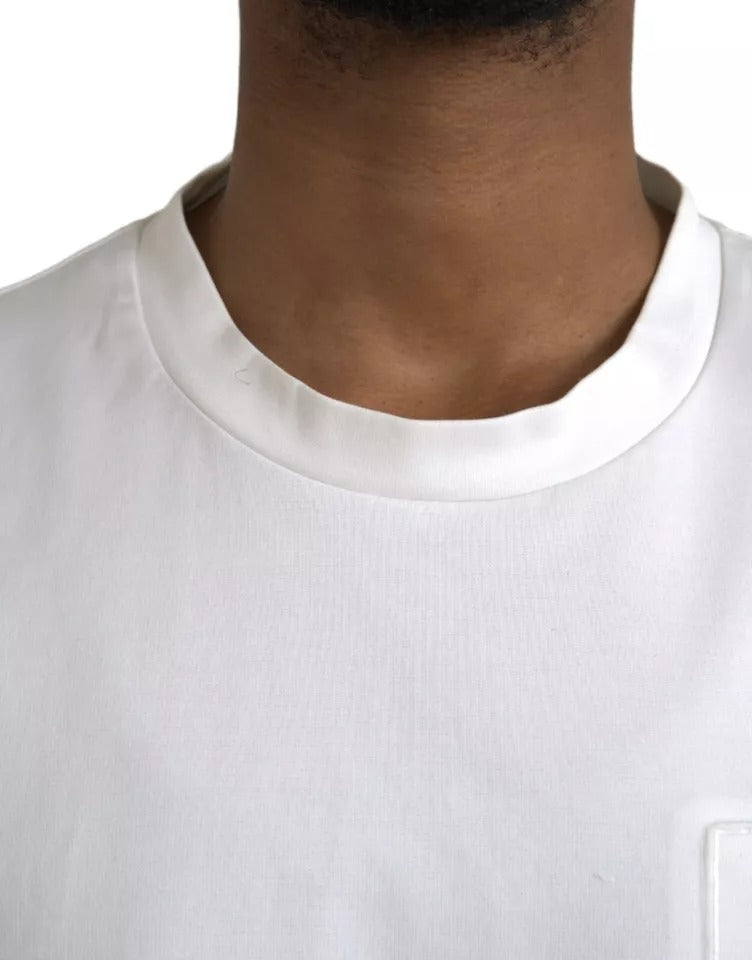 T-shirt blanc Dolce & Gabbana en coton avec logo embossé, col ras du cou, style décontracté.