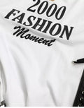 T-shirt blanc Dolce & Gabbana avec slogan imprimé, détails de laçage et design moderne.