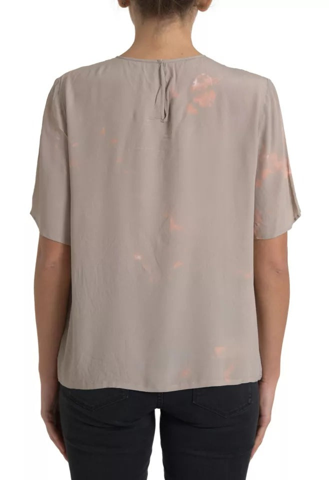 Blouse Dolce & Gabbana marron à col rond et manches courtes, style élégant et décontracté, en tissu léger.