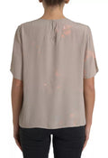 Blouse Dolce & Gabbana marron à col rond et manches courtes, style élégant et décontracté, en tissu léger.
