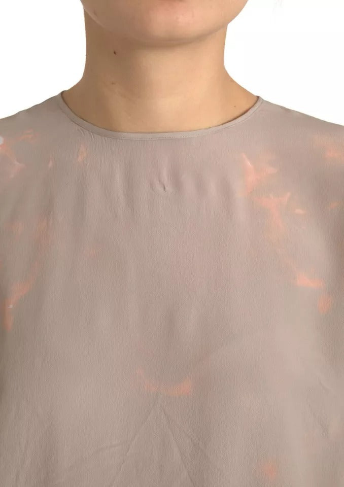 Blouse Dolce & Gabbana marron à col rond à manches courtes, tissu léger et élégant, vue de face.