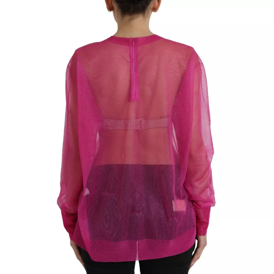 Haut rose transparent à manches longues Dolce & Gabbana avec col ras du cou, tissu léger et élégant.