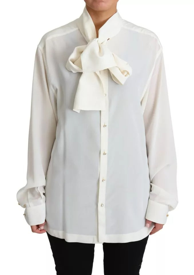 Chemise blanche Dolce & Gabbana en soie avec col ascot pour femme, style élégant et sophistiqué.