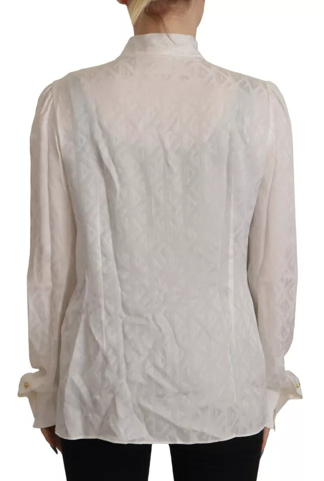 Chemisier Dolce & Gabbana en soie blanche à motif avec col ascot élégant et tendance.