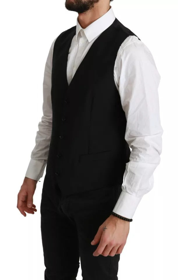 Gilet noir en laine Dolce & Gabbana, ajusté à la taille, pour tenue formelle élégante.