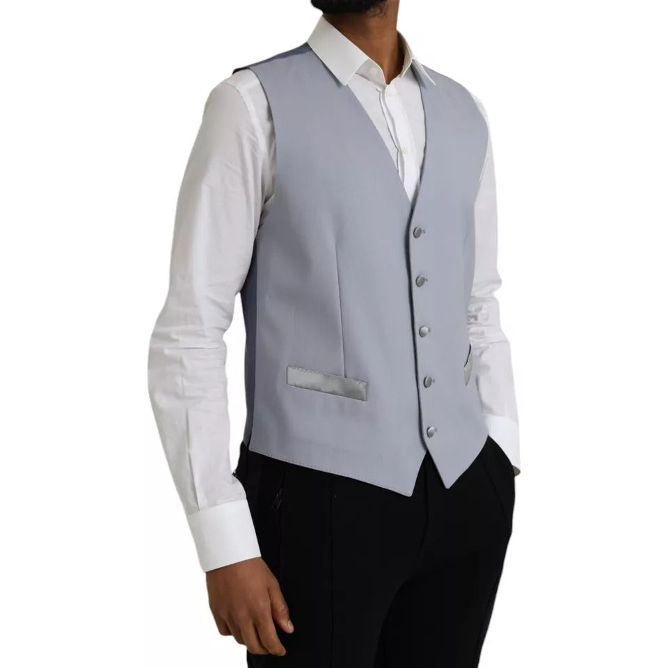 Gilet formel en laine Dolce & Gabbana Light Blue avec coupe élégante et détails sophistiqués, porté sur un mannequin.