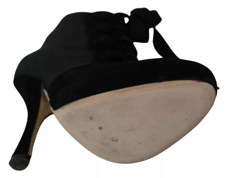 Chaussures Dolce & Gabbana, bottines en daim noir à talon stretch et bout fermé, style élégant et moderne.