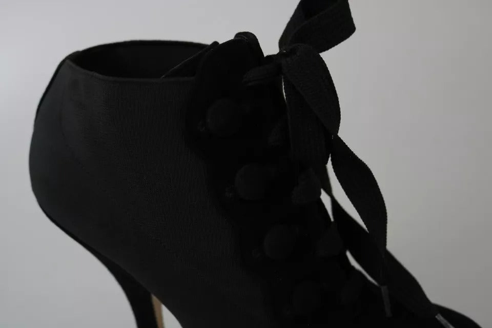 Bottines noires en daim stretch Dolce & Gabbana pour femmes, près du sol, avec design élégant et talons minces.