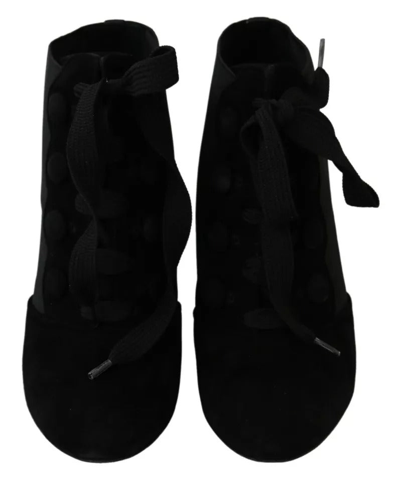Chaussures Dolce & Gabbana bottines en daim noir à talon stretch, vue de profil avec détails élégants.