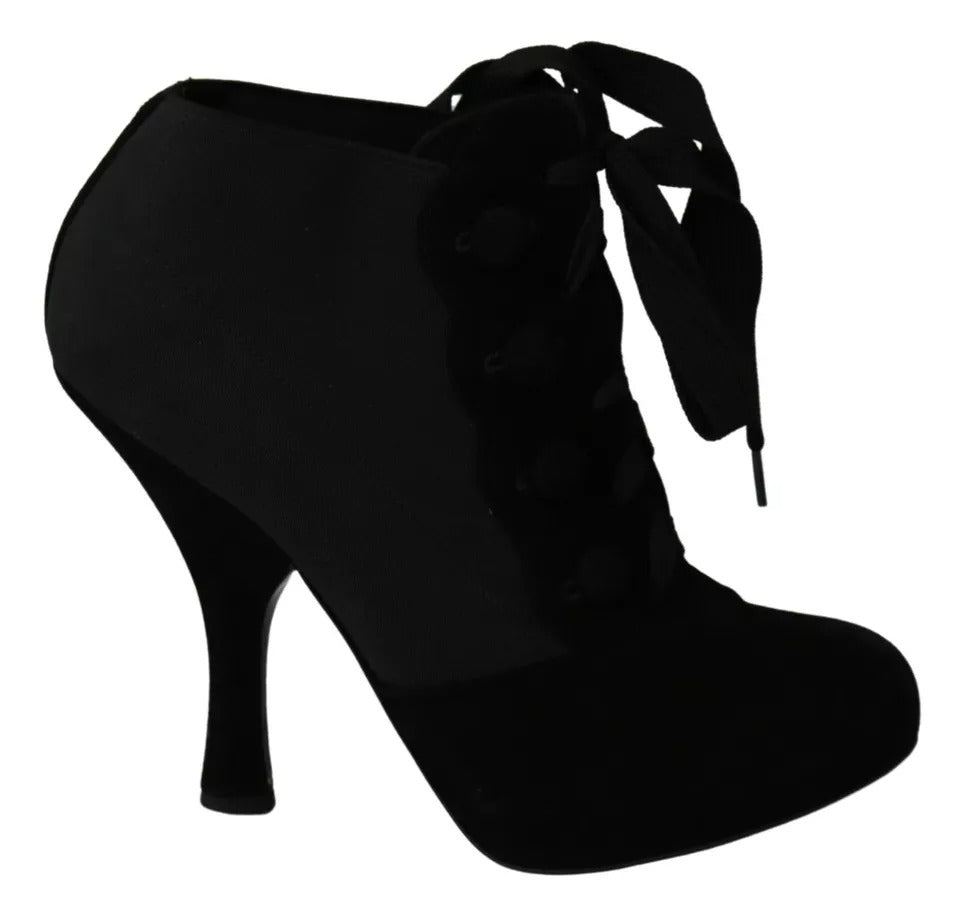 Bottines en daim noir Dolce & Gabbana, chaussures à talon court et semelle en cuir, style élégant et sophistiqué.