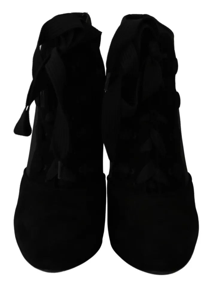 Chaussures Dolce & Gabbana bottines en daim noir à talons courts et bout pointu, style élégant et moderne.