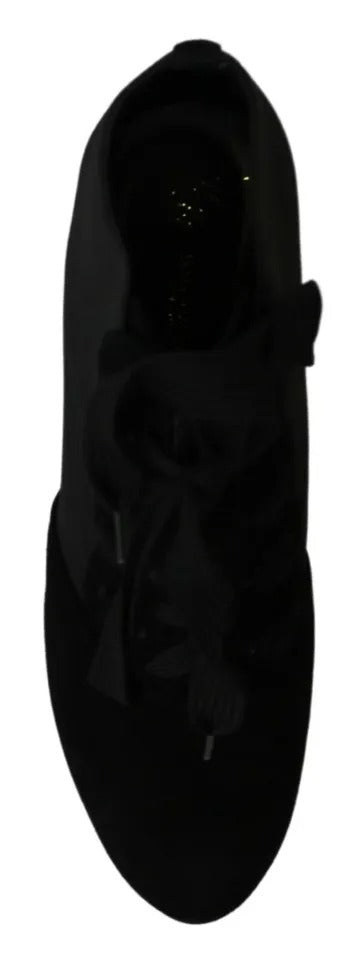 Bottines en daim noir Dolce & Gabbana, chaussures à cheville stretch avec semelle élégante et design sophistiqué.