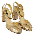 Sandales à talons Dolce & Gabbana Vally avec studs dorés, sandales à talons en cuir noir et détails métalliques.