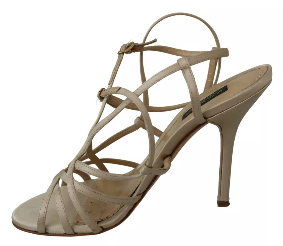 Chaussures à talons dorés en soie Dolce & Gabbana avec bride à la cheville, sandales élégantes et sophistiquées.