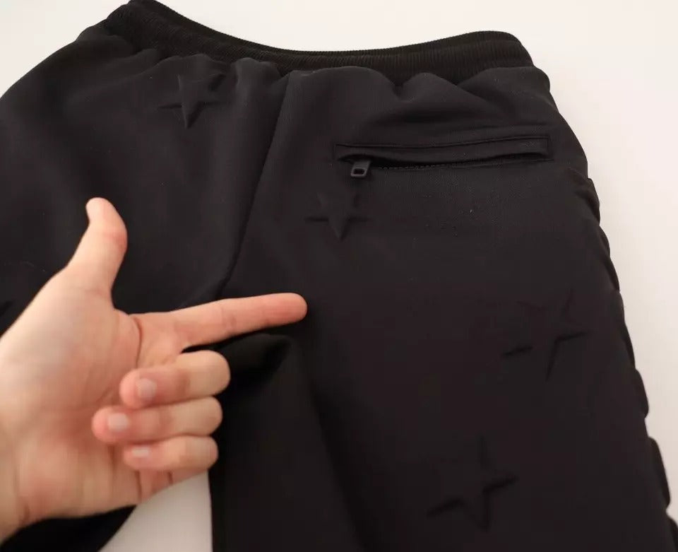 Pantalon jogging noir pour femmes en polyester de Dolce & Gabbana, style décontracté et élégant.