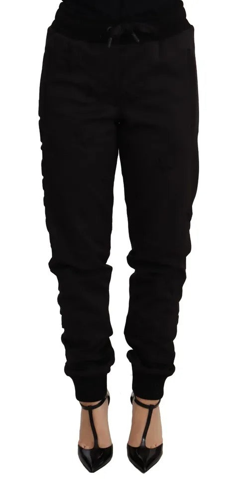 Pantalons joggers noirs pour femmes Dolce & Gabbana en polyester, style décontracté et élégant, visibles sur la photo.