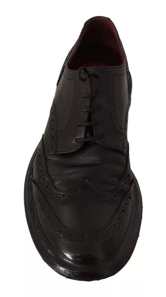 Chaussures formelles Dolce & Gabbana en cuir noir avec brogue Oxford, détails élégants pour homme.
