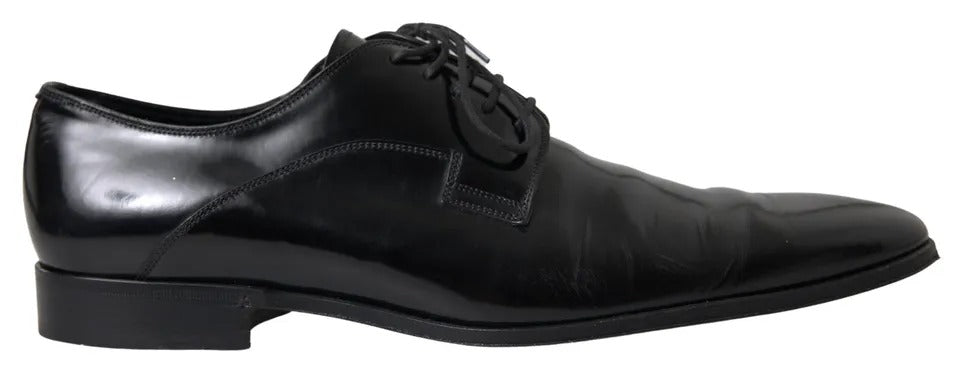 Chaussures formelles en cuir poli noir Dolce & Gabbana pour homme, avec lacets et finition élégante.