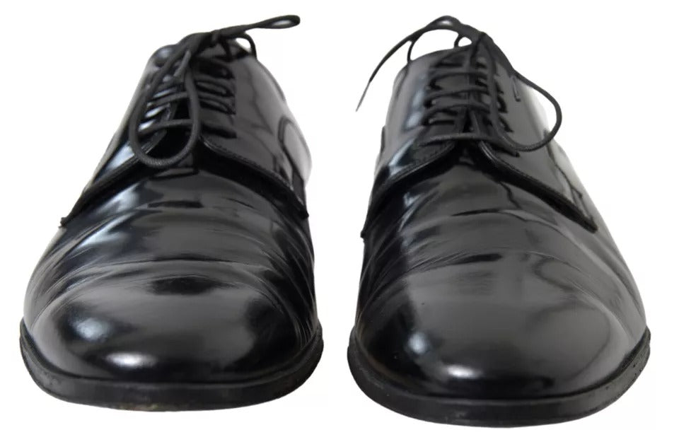 Chaussures de ville en cuir noir brillant de luxe Dolce & Gabbana pour homme, élégantes et sophistiquées.