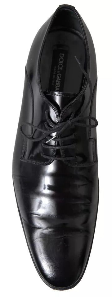 Chaussures formelles en cuir poli noir Dolce & Gabbana pour homme, élégantes et sophistiquées.