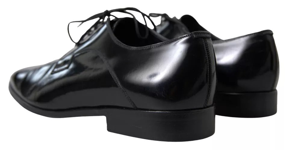 Chaussures formelles en cuir poli noir de Dolce & Gabbana, élégantes et sophistiquées, pour homme.